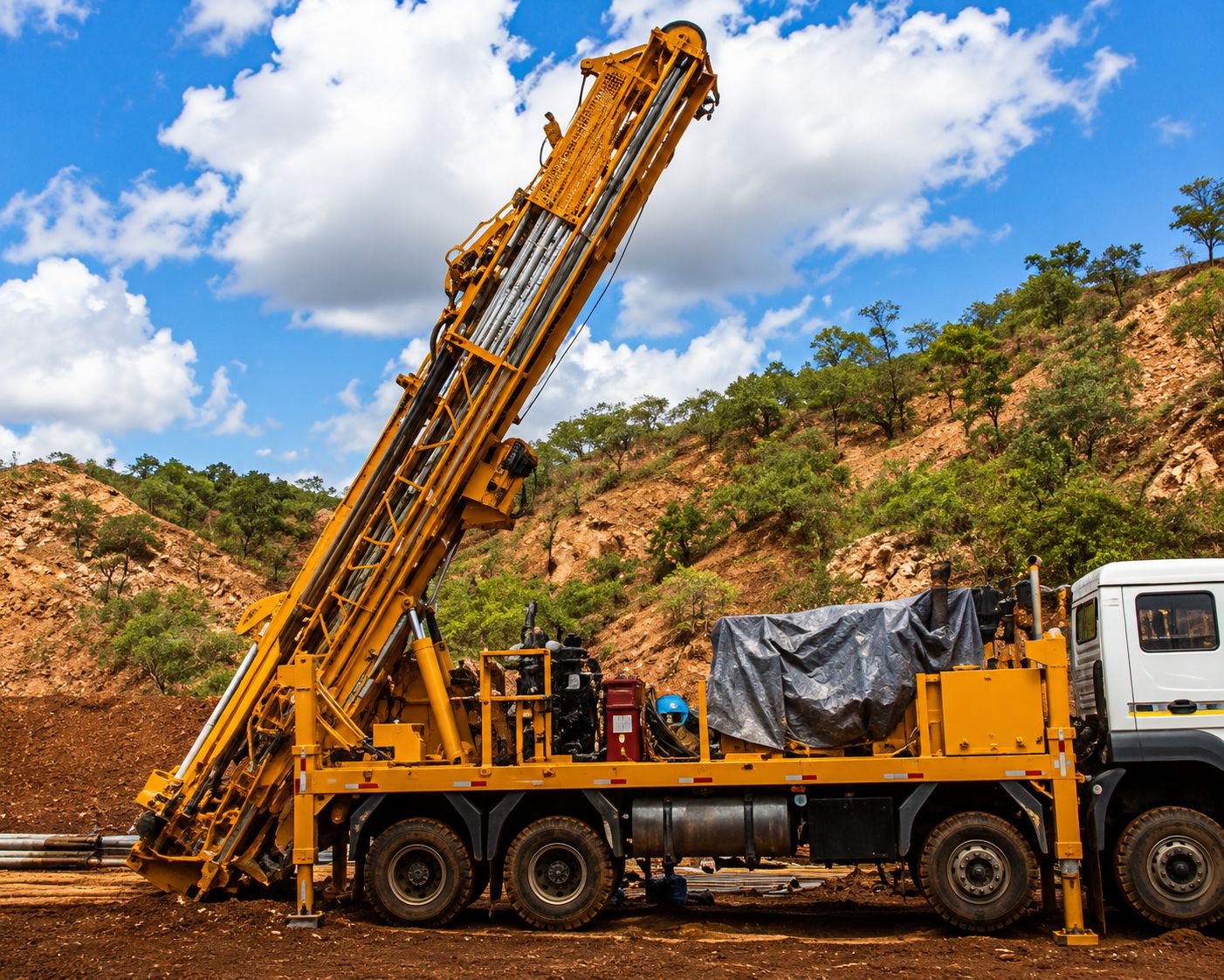 Illustrative photograph of a drill rig and crew